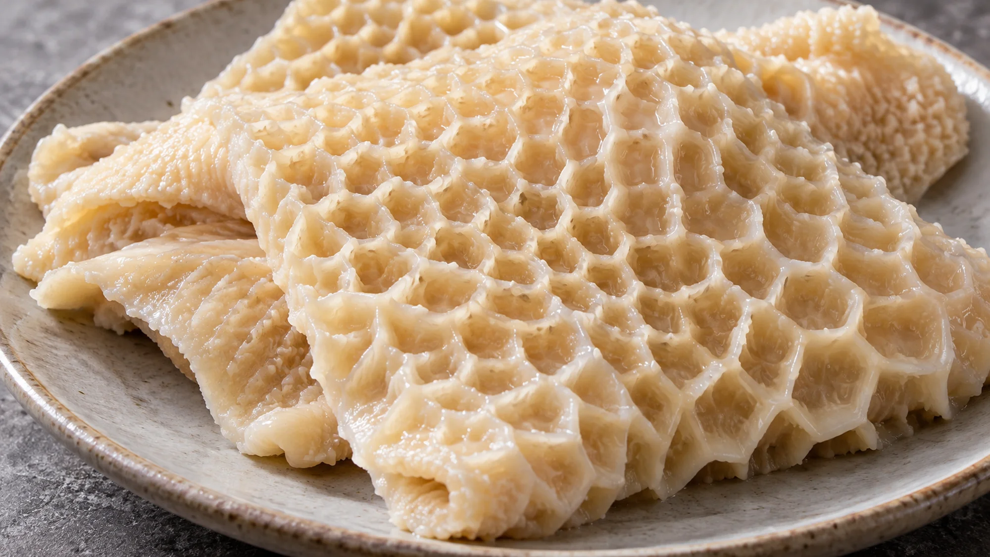 Close view of beef tripe showing its raised honeycomb texture