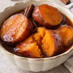 Camotes en dulce recipe card with tender sweet potato rounds and syrup