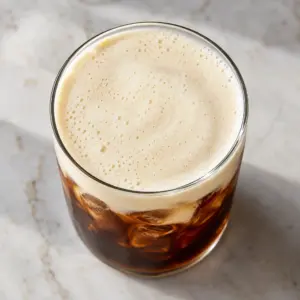 Overhead view of the cold foam recipe topping iced coffee