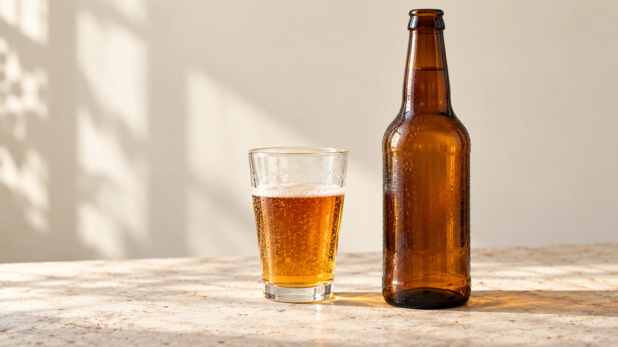 Gluten free beer guide: an unlabelled bottle beside a glass