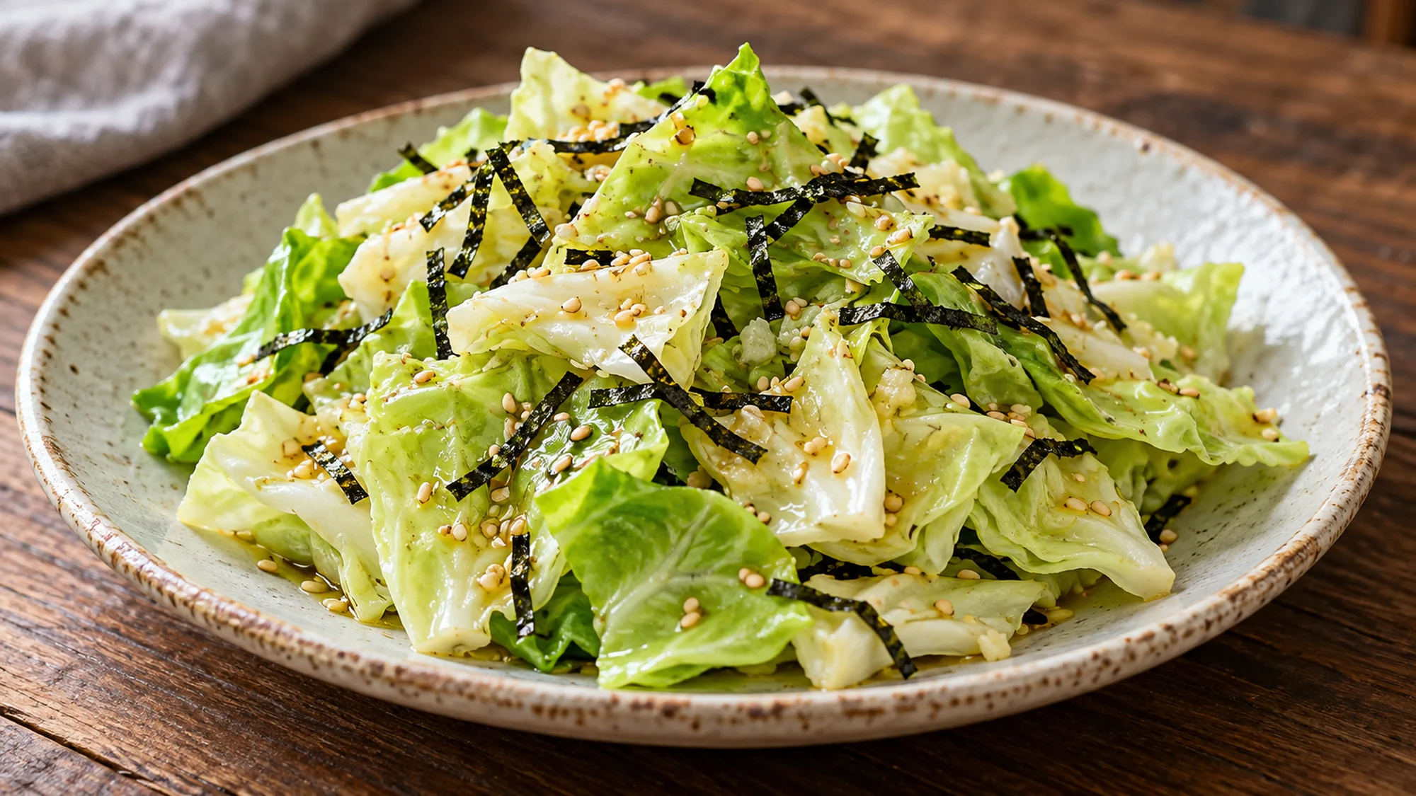 Crisp cabbage leaves with toasted sesame seeds and nori