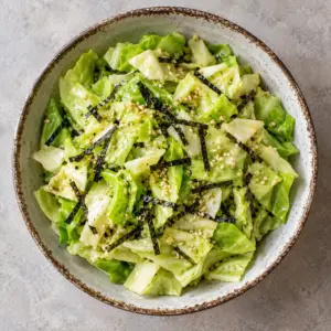 Overhead bowl of yamitsuki cabbage with nori strips
